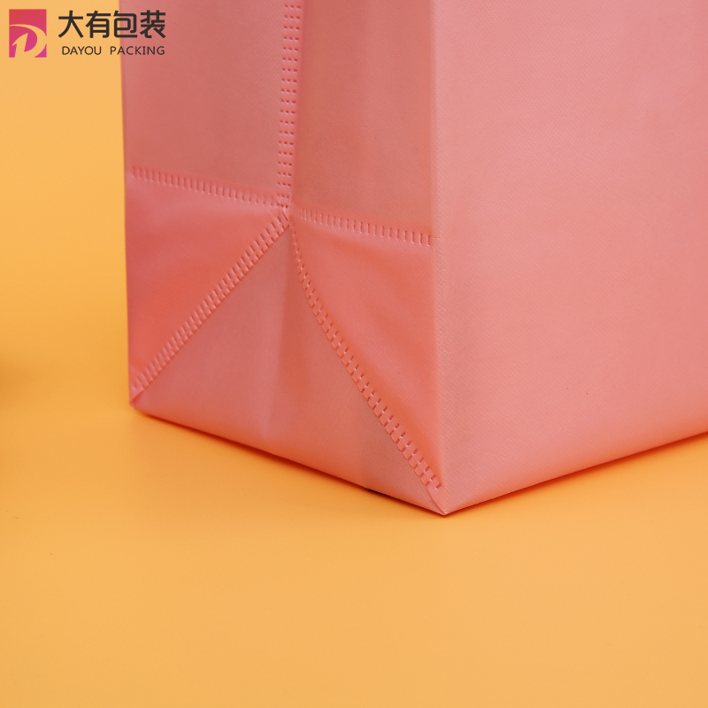 Low MOQ Factory Eco-friendly Custom Printed Logo Pink Reusable Folding Non Woven Shopping Bag